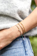 Estella Bartlett Gold Bead Rainbow Cord Bracelet
